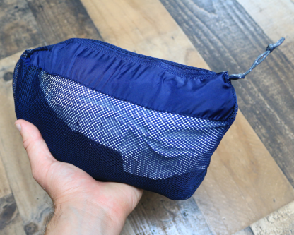 image of the Banner Rain Jacket in pouch